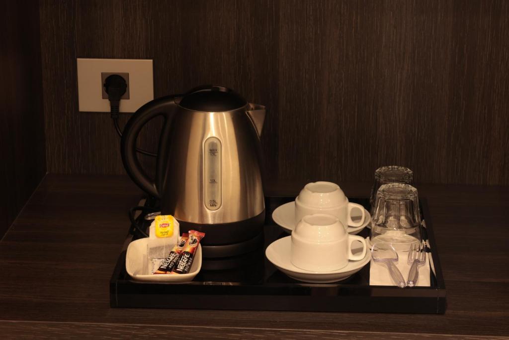 Příslušenství pro přípravu čaje a kávy v ubytování Monteverde Hotel