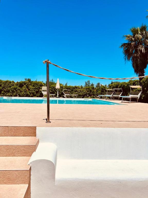 Bazén v ubytovaní Baglio Cudia Resort alebo v jeho blízkosti