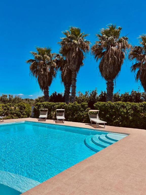 Bazén v ubytovaní Baglio Cudia Resort alebo v jeho blízkosti