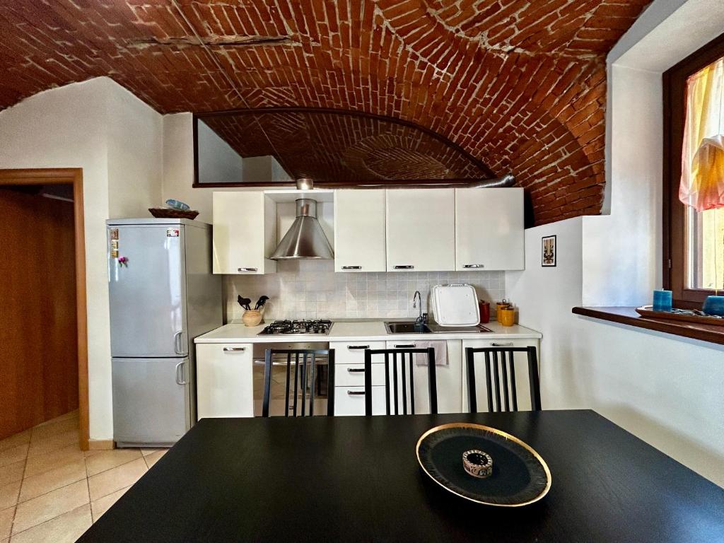 A kitchen or kitchenette at Appartamento G&G