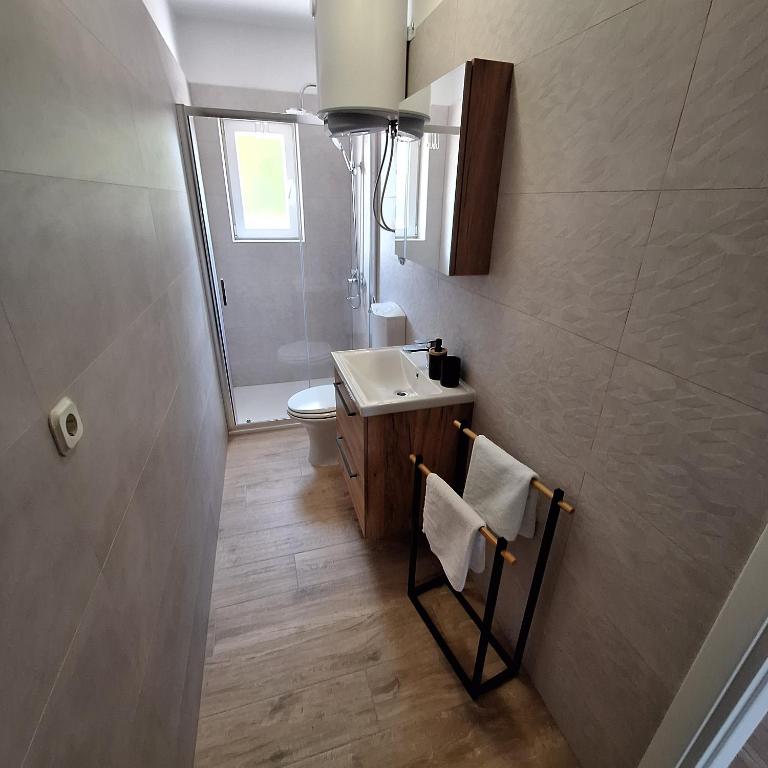Koupelna v ubytování Rumora Ivan Apartment