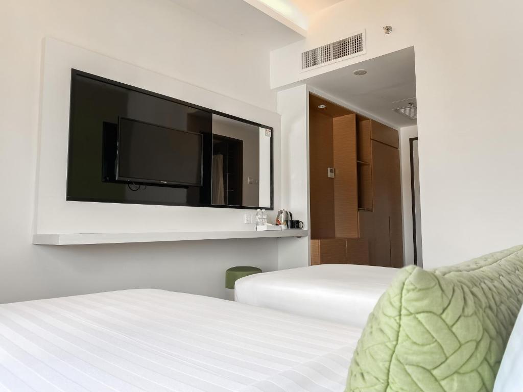 TV a/nebo společenská místnost v ubytování Amansari Hotel Desaru