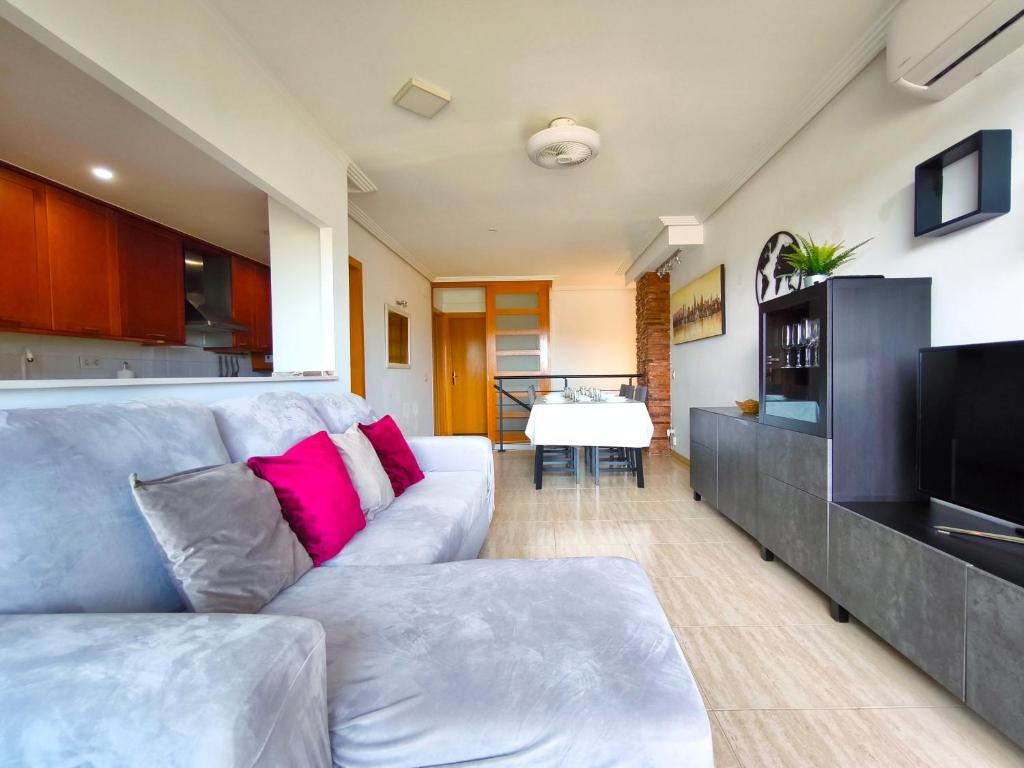 TV a/nebo společenská místnost v ubytování Duplex con piscina en Rubí
