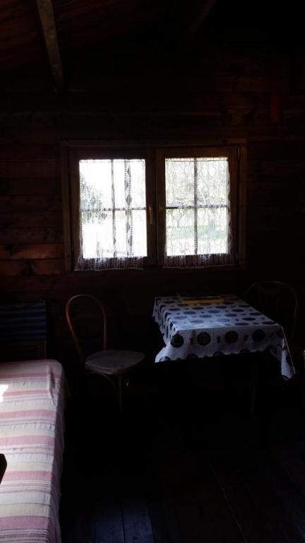A bed or beds in a room at Campeggio Bungalow Darwin