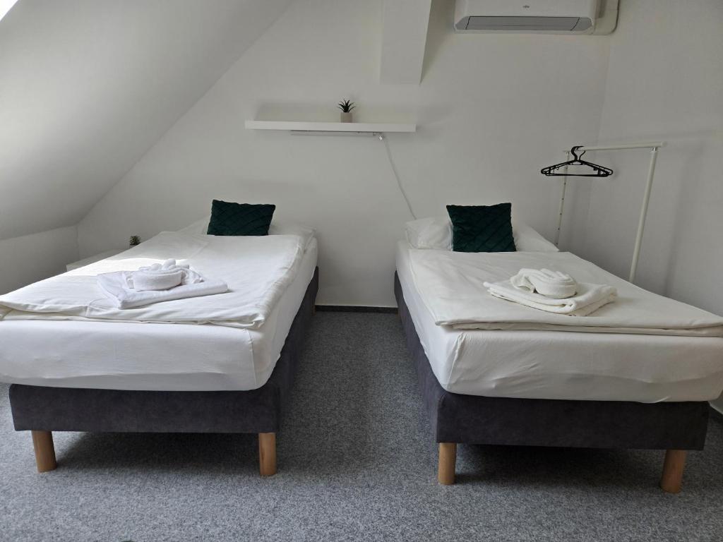 Postel nebo postele na pokoji v ubytování Hotel Restaurant Na Statku