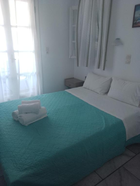 Postel nebo postele na pokoji v ubytování villa polemis