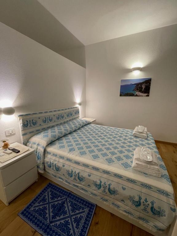 Postel nebo postele na pokoji v ubytování Sa Troppa de sos chentu