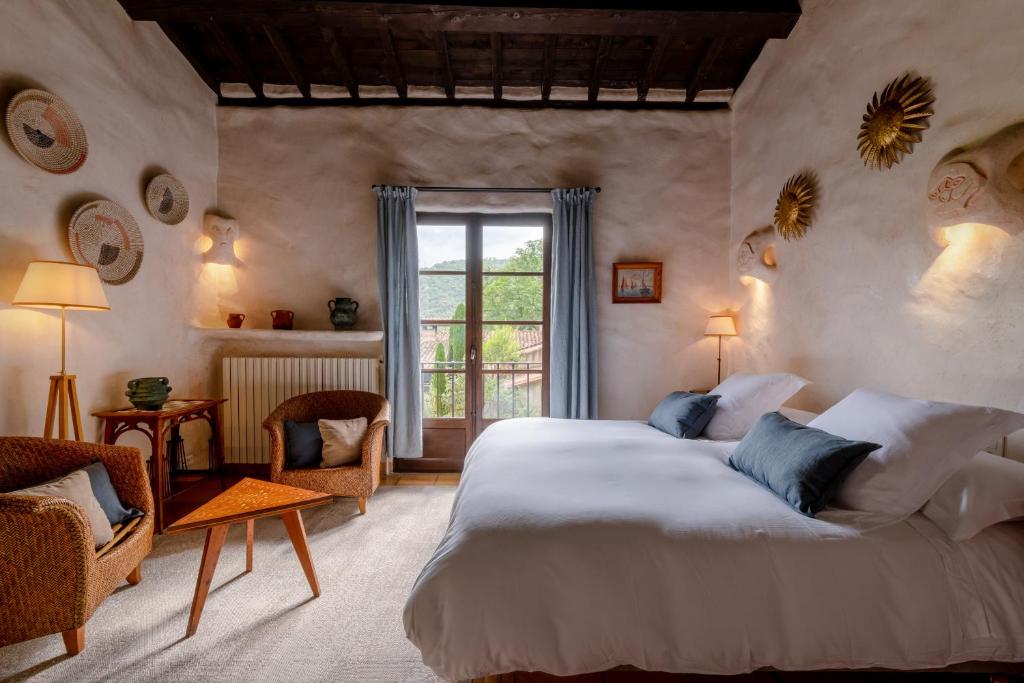 Postel nebo postele na pokoji v ubytování Château De Riell