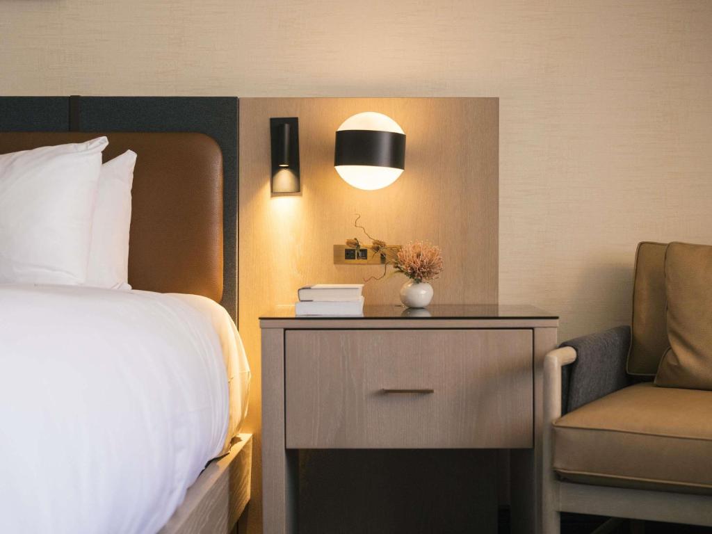 Postel nebo postele na pokoji v ubytování Fairmont Tremblant