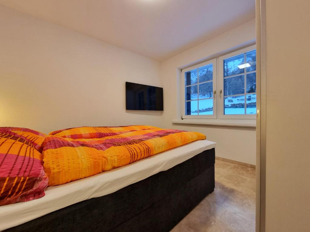 Postel nebo postele na pokoji v ubytování Zum Lerch Penthouse