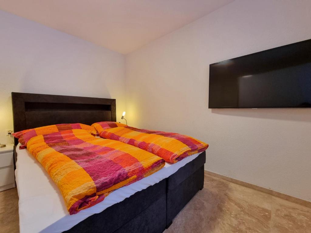 Postel nebo postele na pokoji v ubytování Zum Lerch Penthouse