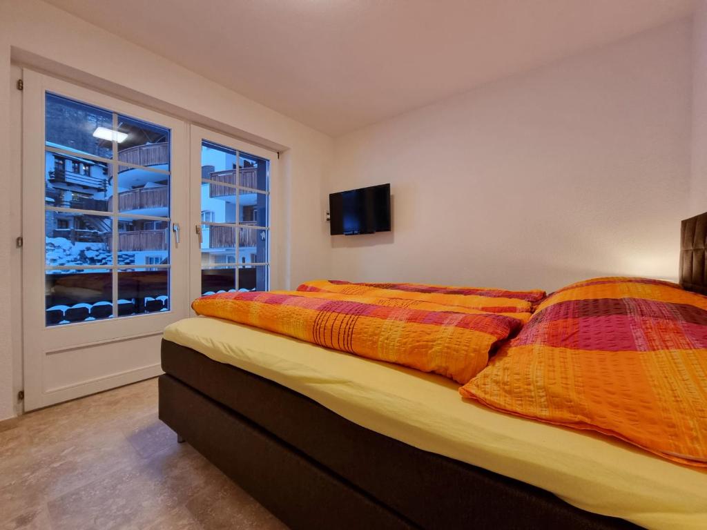 Postel nebo postele na pokoji v ubytování Zum Lerch Penthouse