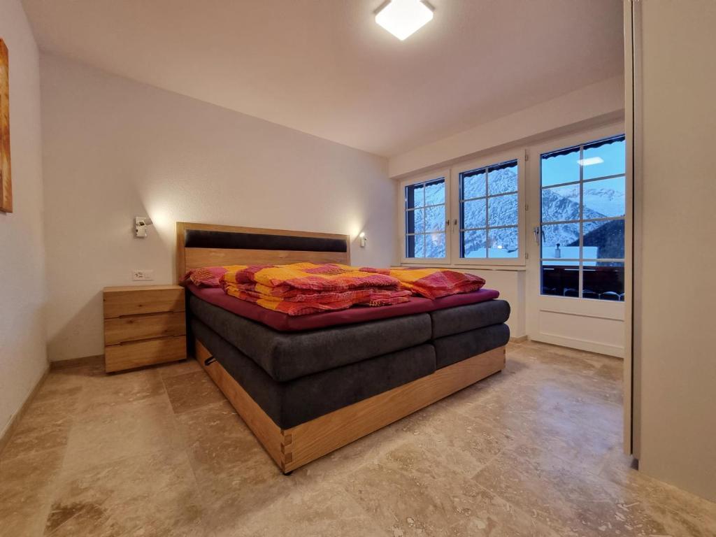 Postel nebo postele na pokoji v ubytování Zum Lerch Penthouse