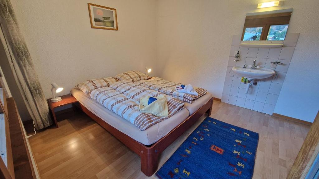 Postel nebo postele na pokoji v ubytování Apartment Etzel