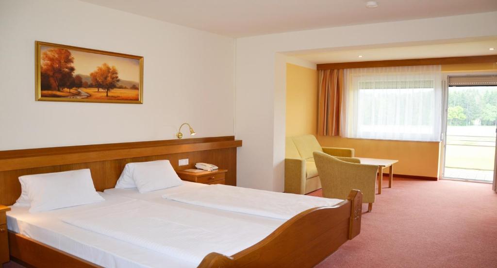 Voodi või voodid majutusasutuse Hotel Fantur toas