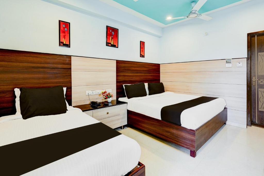 Super Townhouse Chennai Near Airport Formerly Sai Bala Budgetにあるベッド