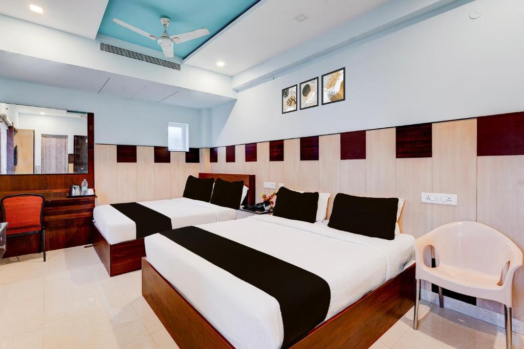 Super Townhouse Chennai Near Airport Formerly Sai Bala Budgetにあるベッド