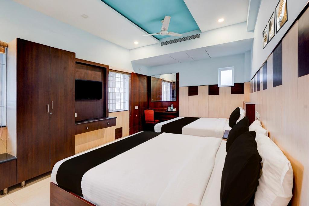 Super Townhouse Chennai Near Airport Formerly Sai Bala Budgetにあるベッド