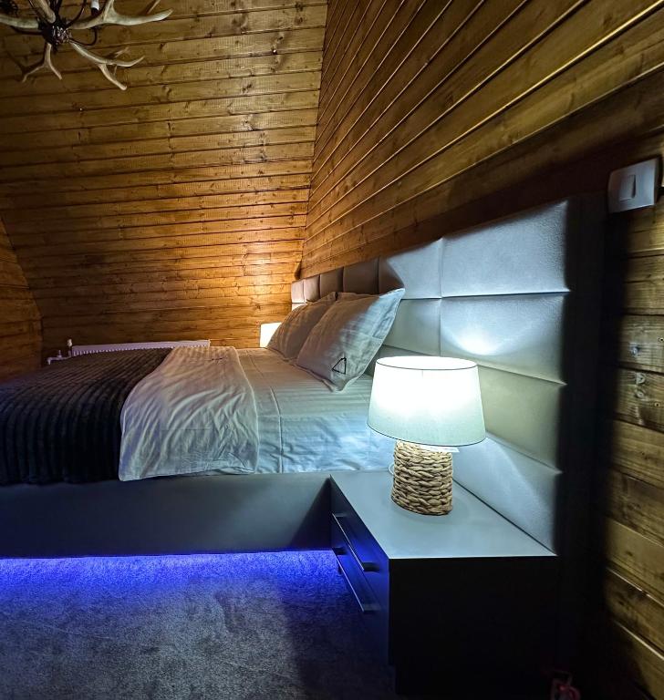 Postel nebo postele na pokoji v ubytování C&R Lodge