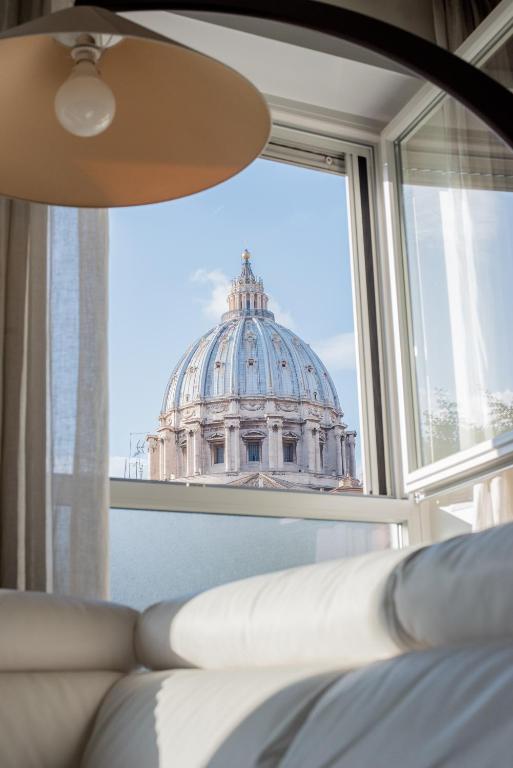 Łóżko lub łóżka w pokoju w obiekcie B&B Fantasie Romane