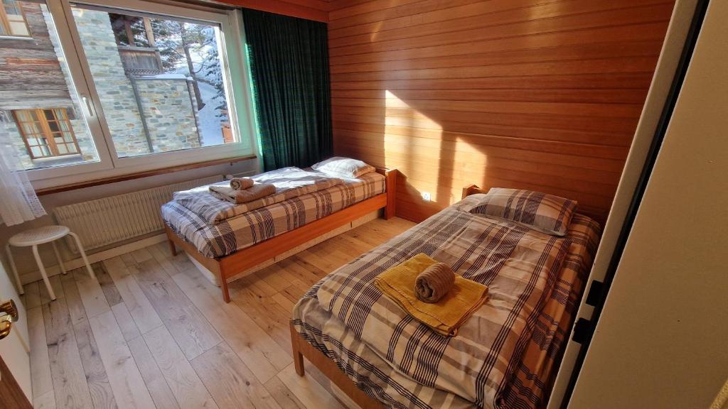 Postel nebo postele na pokoji v ubytování L'oree 12