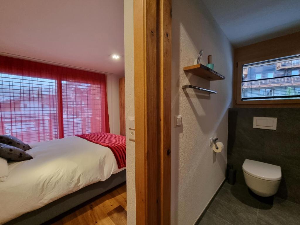 Postel nebo postele na pokoji v ubytování Gletschergarten