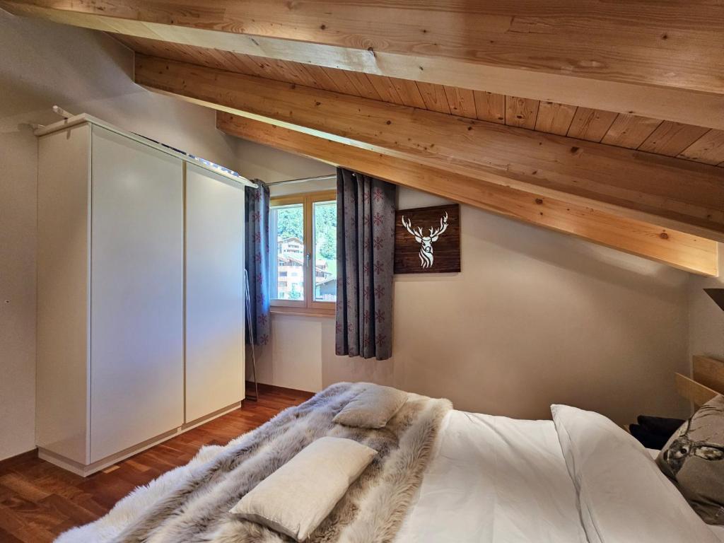 Postel nebo postele na pokoji v ubytování Aramis Penthouse