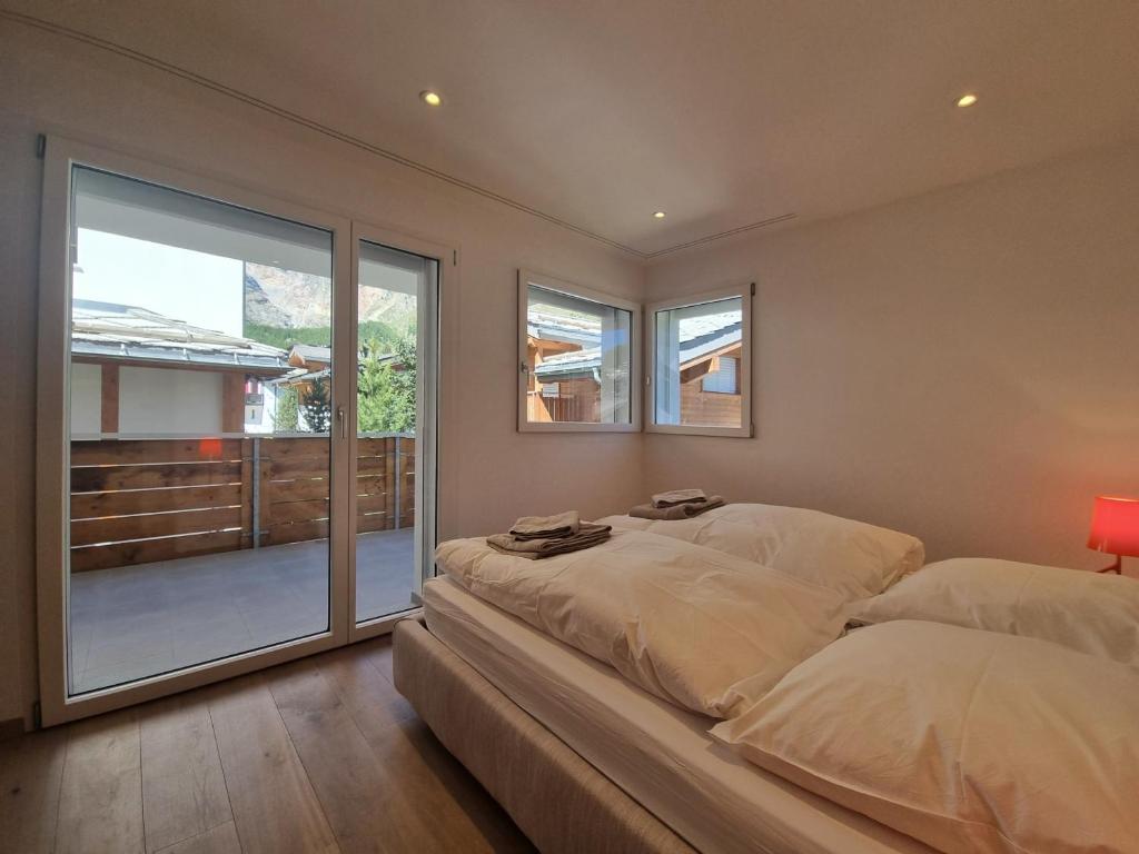 Postel nebo postele na pokoji v ubytování Duplex Apartment Bella Coppia