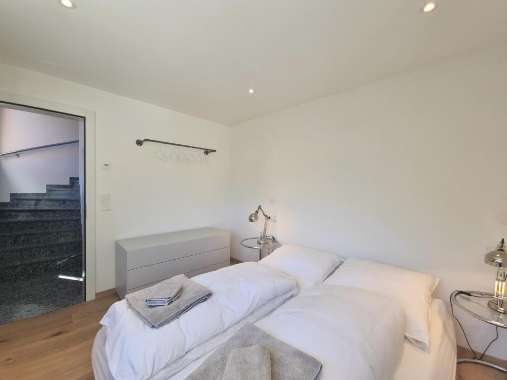 Postel nebo postele na pokoji v ubytování Duplex Apartment Bella Coppia