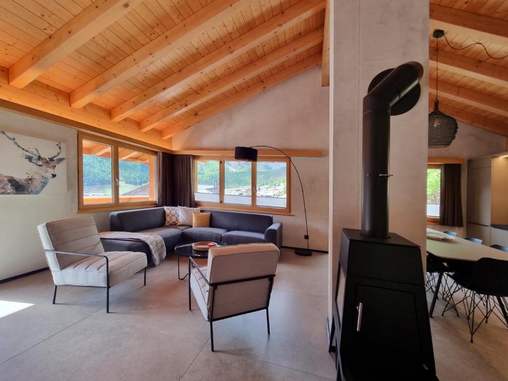 Posezení v ubytování Sole Penthouse
