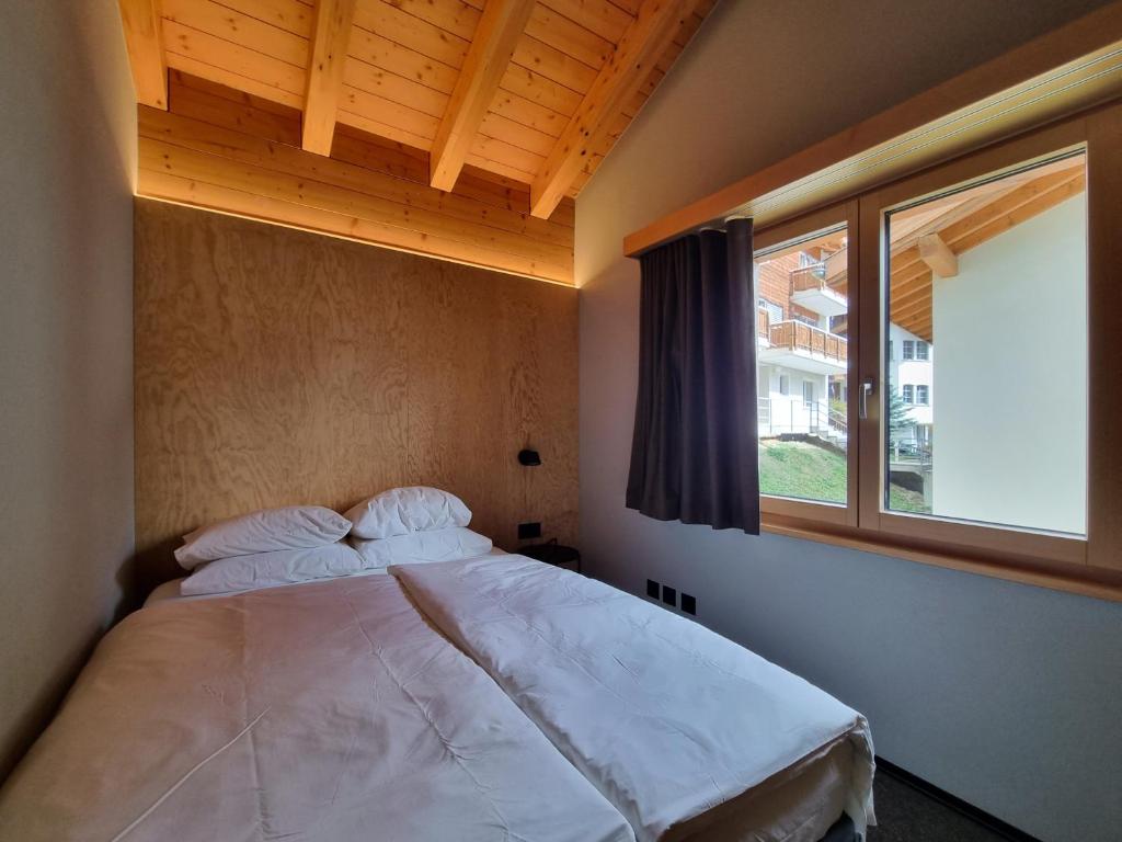 Postel nebo postele na pokoji v ubytování Sole Penthouse