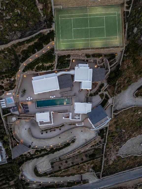 an aerial view of a building with a tennis court at Villa Levi's in Mykonos