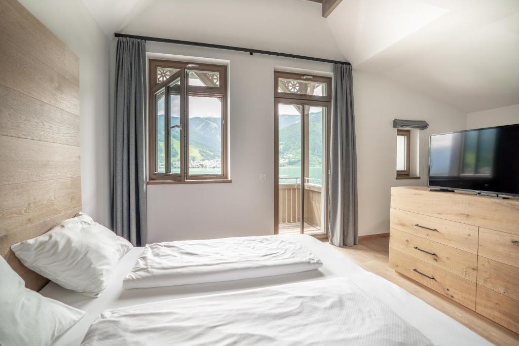 Postel nebo postele na pokoji v ubytování Seehotel Bellevue by keyone