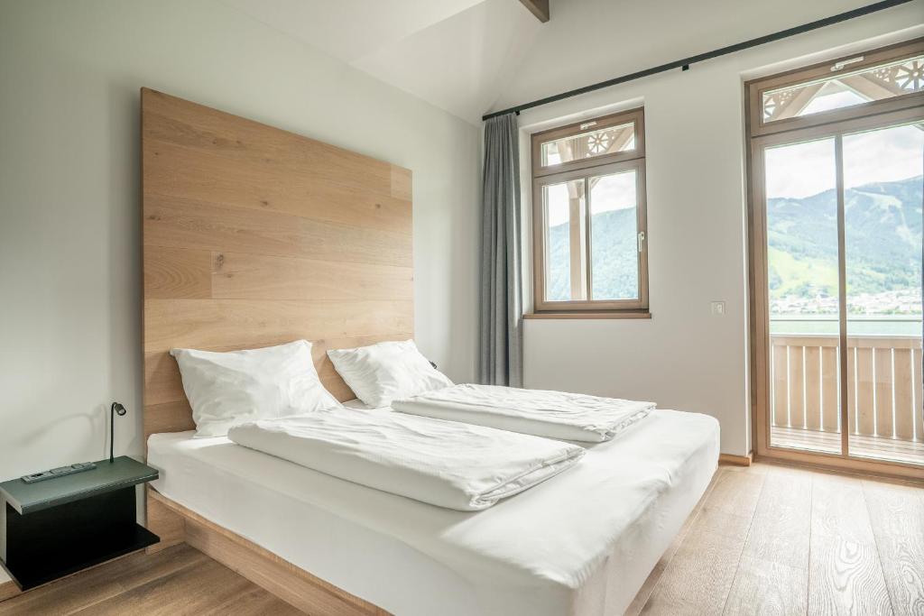 Postel nebo postele na pokoji v ubytování Seehotel Bellevue by keyone