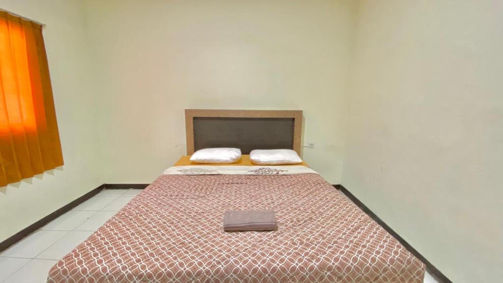 Postel nebo postele na pokoji v ubytování Allisa Motel