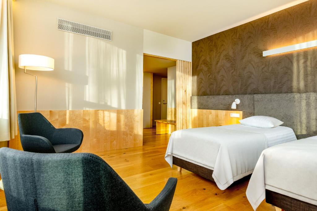 Postel nebo postele na pokoji v ubytování Hotel Tartu