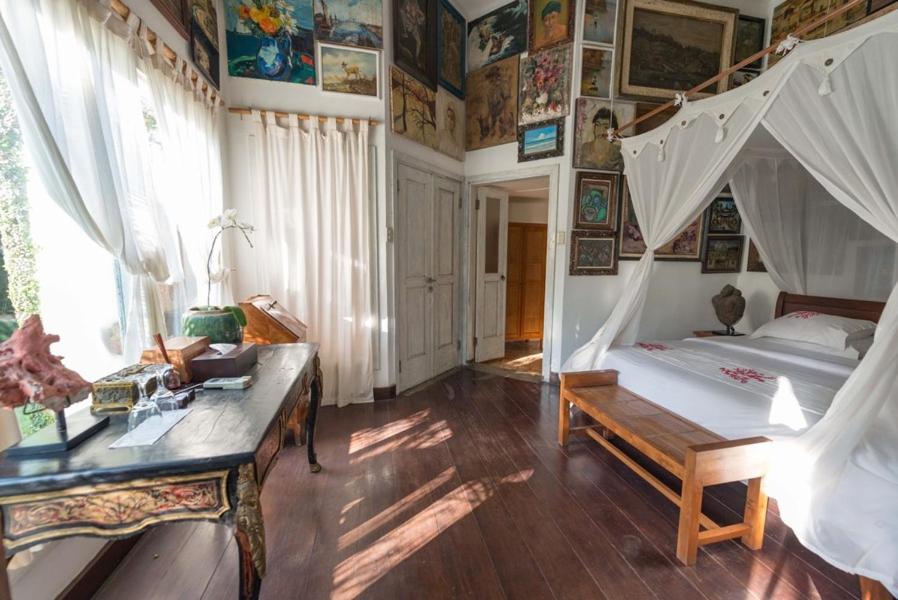 Postel nebo postele na pokoji v ubytování Morabito Art Villa