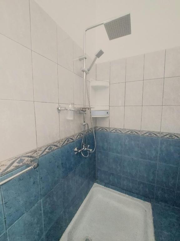 Koupelna v ubytování La Perla Bianca Residence