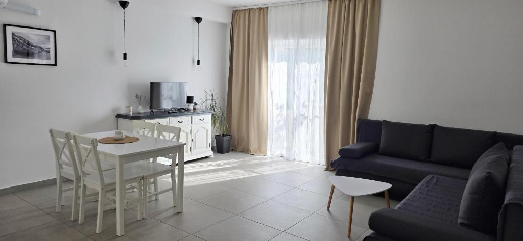TV o dispositivi per l'intrattenimento presso Island Cottage Apartment