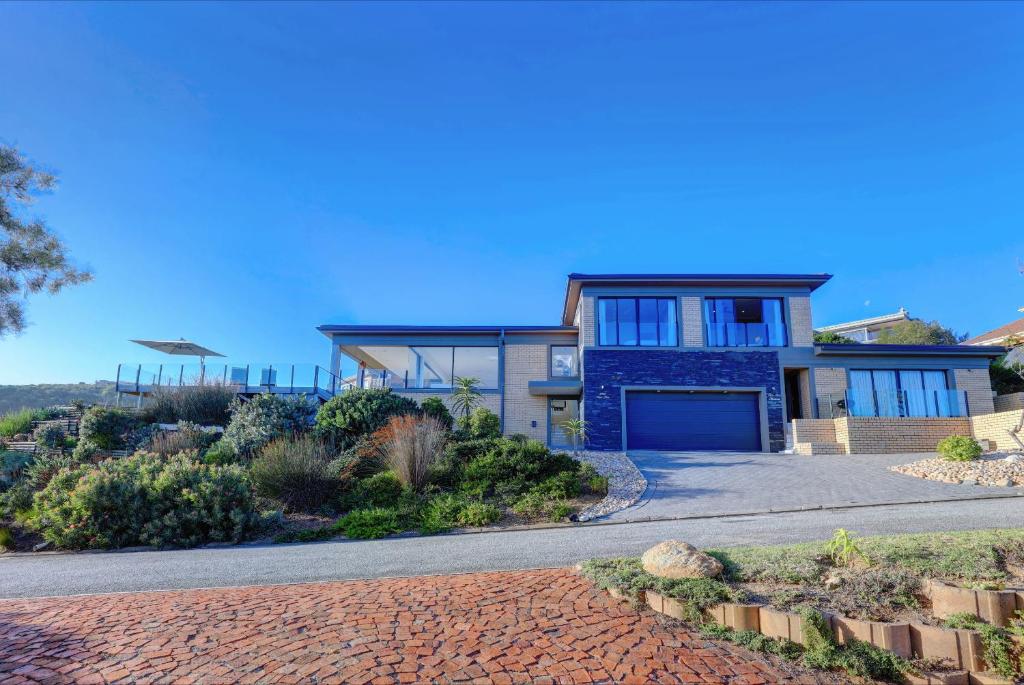 an image of a house with a driveway at Num Num House 6 Sleeper in Wilderness