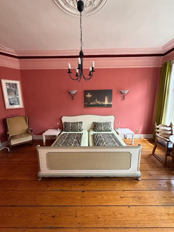 Postel nebo postele na pokoji v ubytování Gästezimmer am Hansaplatz