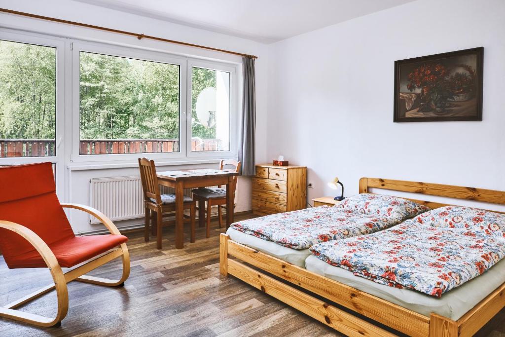 Postel nebo postele na pokoji v ubytování Apartmány Pod Přehradou