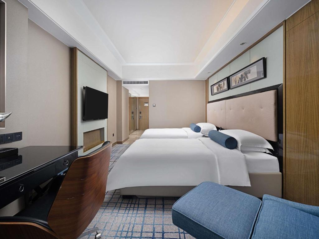 TV a/nebo společenská místnost v ubytování Pullman Shanghai Jingan