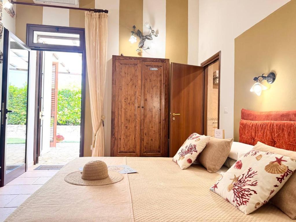 Posteľ alebo postele v izbe v ubytovaní Villa B&B Antiche Macine del Salento - nel cuore del Salento