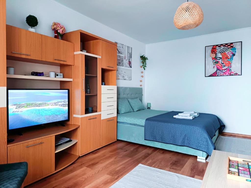 Postel nebo postele na pokoji v ubytování Sunrise Beachfront Relax Residence