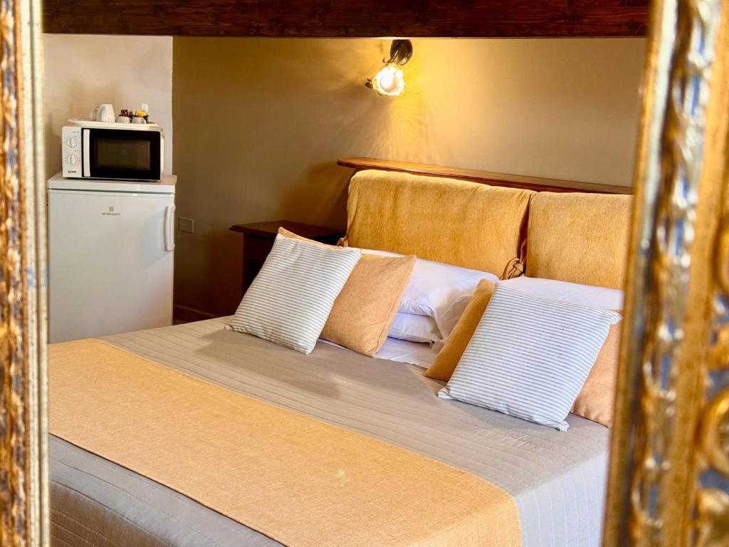 Posteľ alebo postele v izbe v ubytovaní Villa B&B Antiche Macine del Salento - nel cuore del Salento