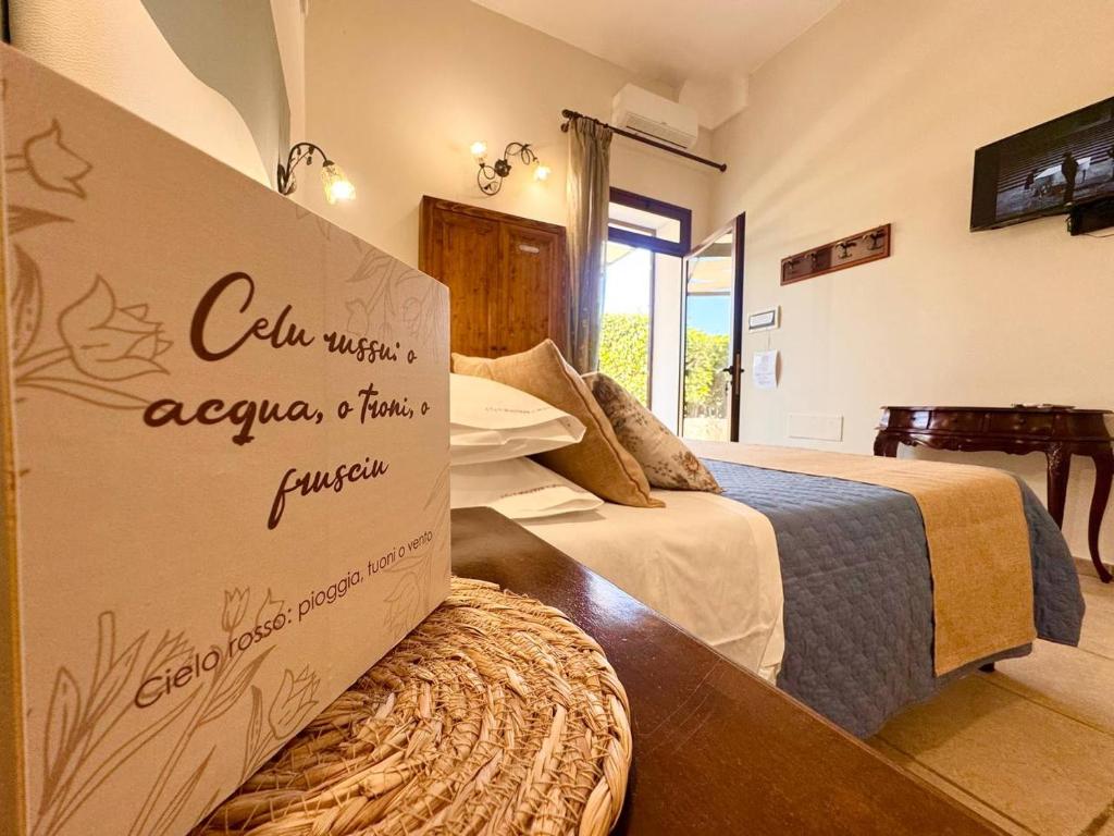 Posteľ alebo postele v izbe v ubytovaní Villa B&B Antiche Macine del Salento - nel cuore del Salento