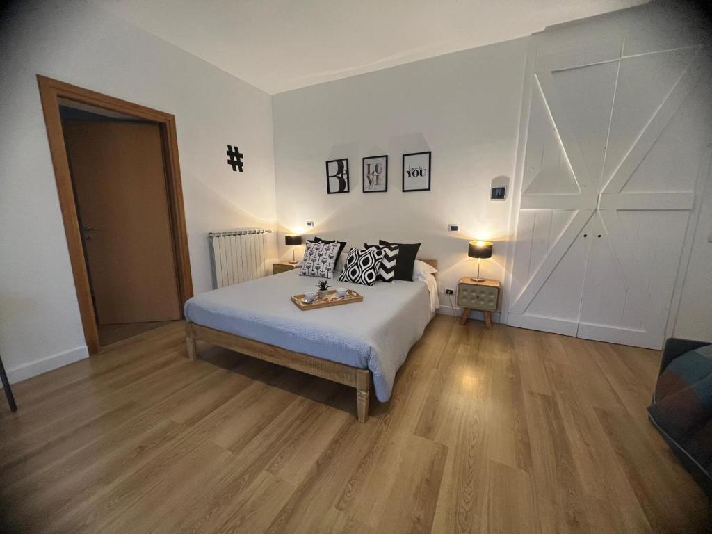Postel nebo postele na pokoji v ubytování GUEST HOUSE IL LEONE
