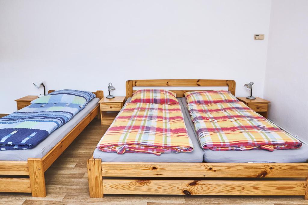 Postel nebo postele na pokoji v ubytování Apartmány Pod Přehradou