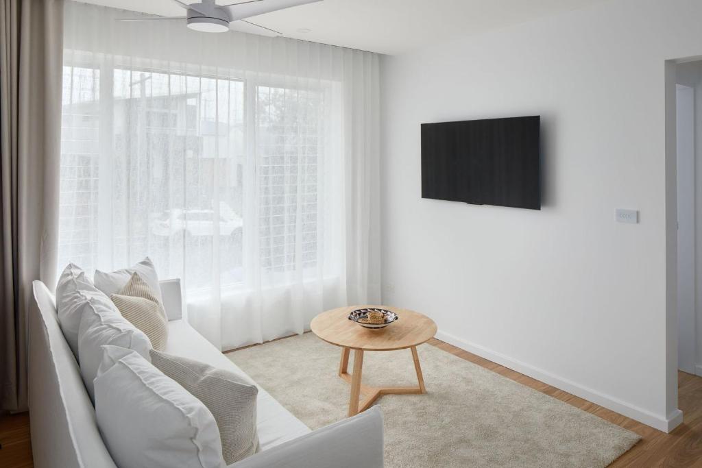 TV a/nebo společenská místnost v ubytování The Breeze